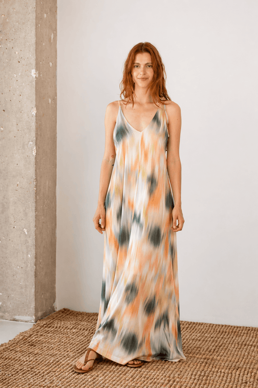 Printed Ecovero Viscose Maxi Dress worn by a model, showcasing its flowy design and seasonal print.