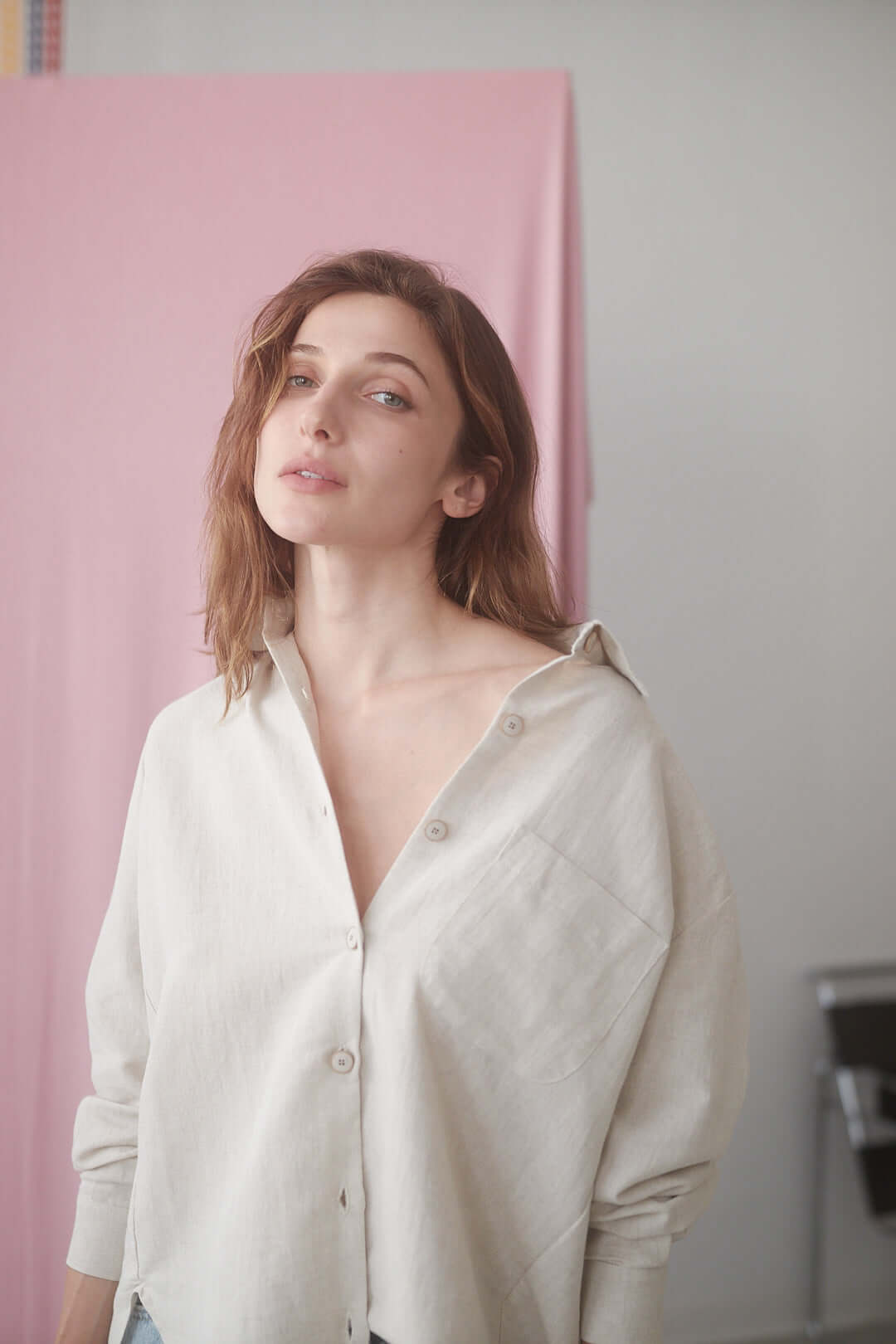 Natural wide shirt in soft organic cotton and linen, styled effortlessly for modern fashion.