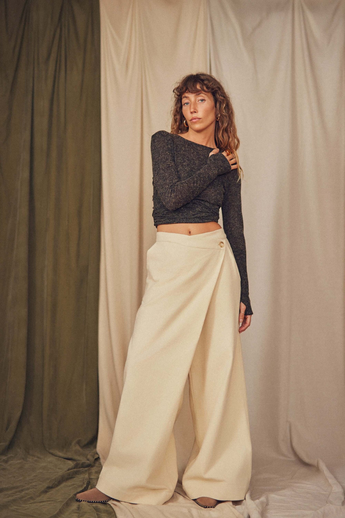 Woman wearing oat wrap trousers.