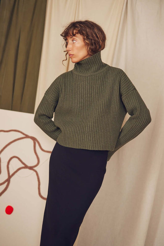 Khaki Heavy Knitted Sweater featuring a ribbed texture and relaxed fit, perfect for autumn layering.