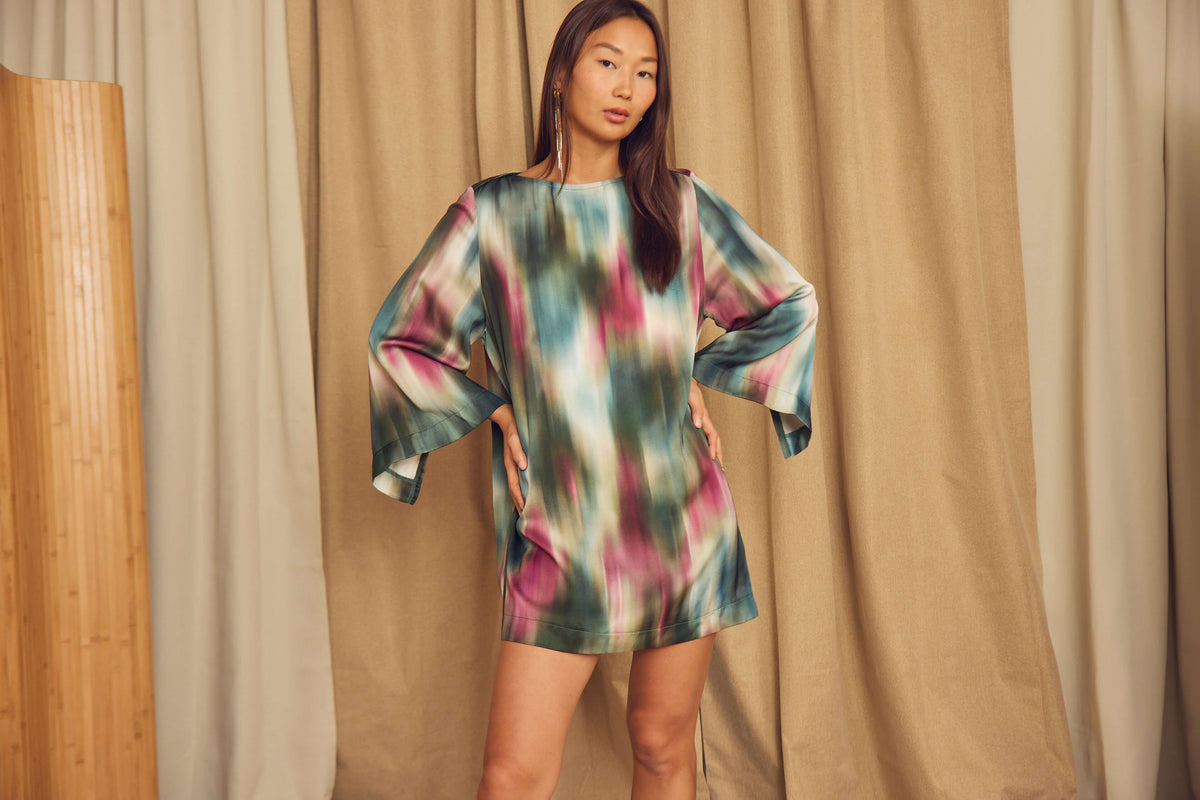 Printed ECOVERO Viscose Mini Dress with Flared Sleeves showcased by a model against a neutral backdrop.