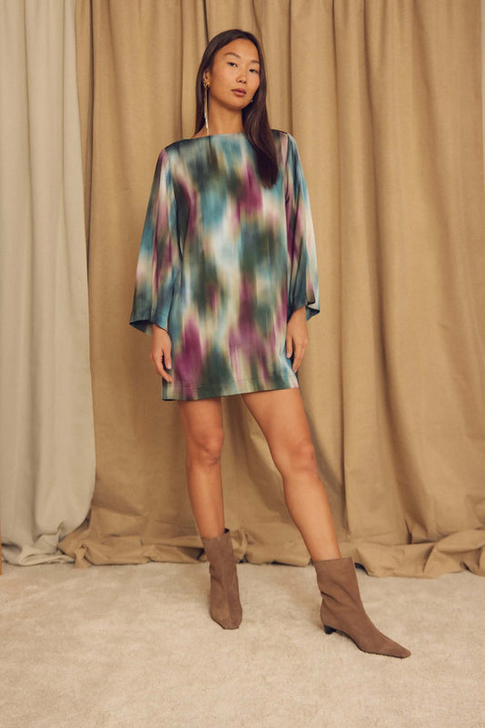 Printed ECOVERO Viscose Mini Dress with Flared Sleeves showcased on a model with a textured backdrop.
