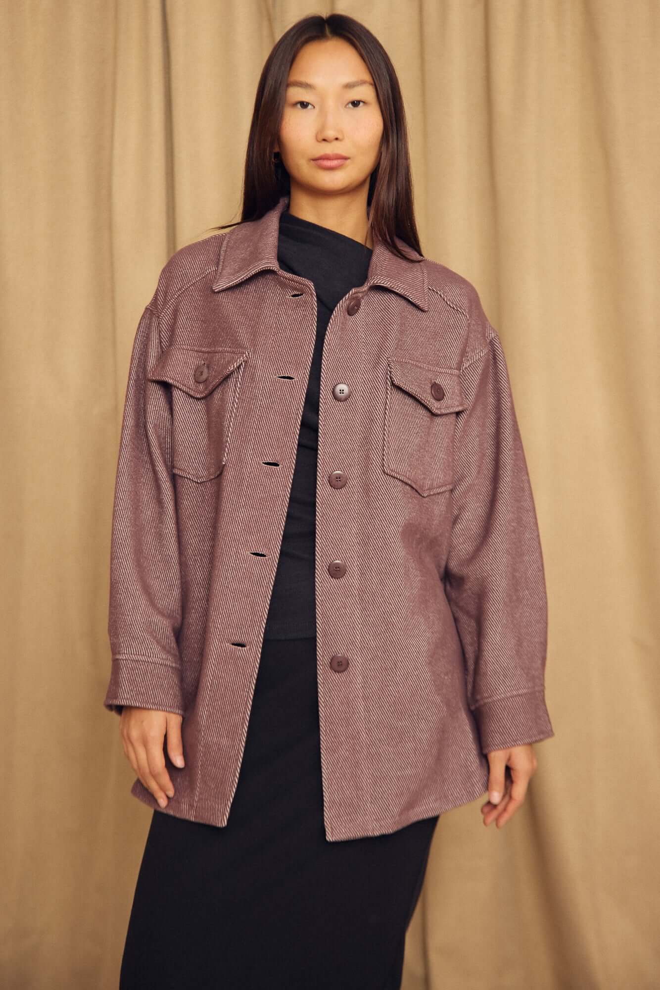 Cocoa Organic Cotton Shacket displayed by a model, showcasing its relaxed oversized fit and stylish design.