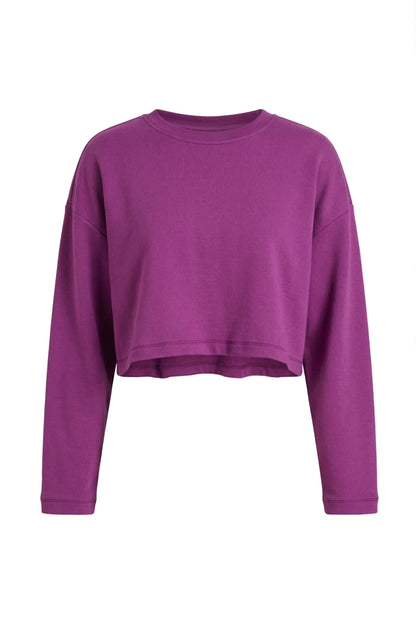 Plum Organic Cotton Oversized Crop Top in vibrant purple, featuring long sleeves and a relaxed cropped design.