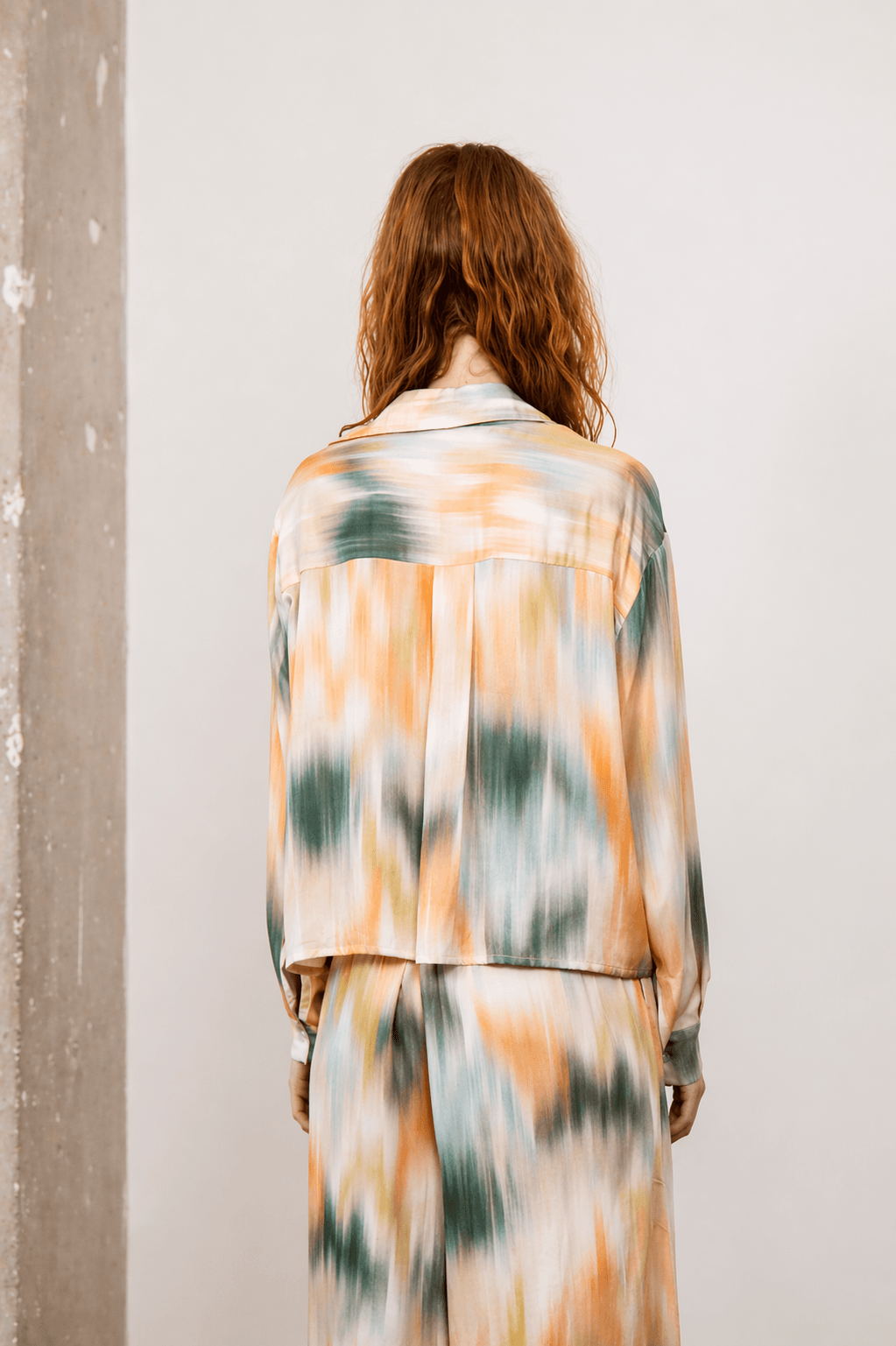 Printed Cropped Ecovero Viscose Oversized Shirt shown from the back, featuring a colorful seasonal print.
