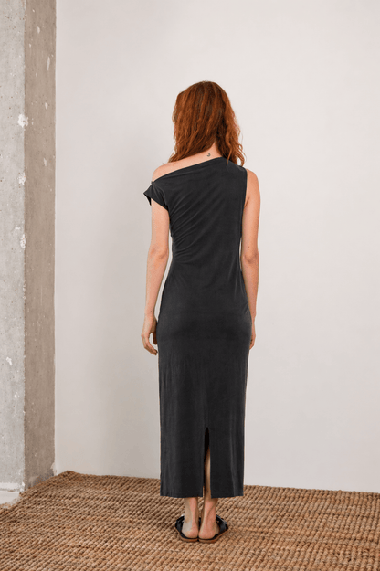 Back view of Drape Cupro Midi Dress in Slate Black showcasing its sultry draped design and elegant silhouette.