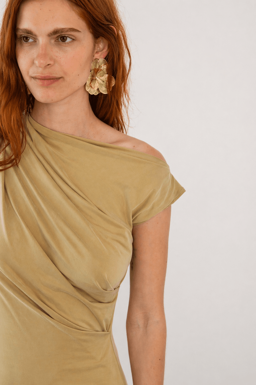 Drape Cupro Midi Dress in Olive worn by a model, showcasing the draped neckline and soft jersey fabric.