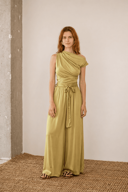 Wide Ecovero Trousers in Soft Olive model showcasing elegant style and breathable fabric in a relaxed fit.