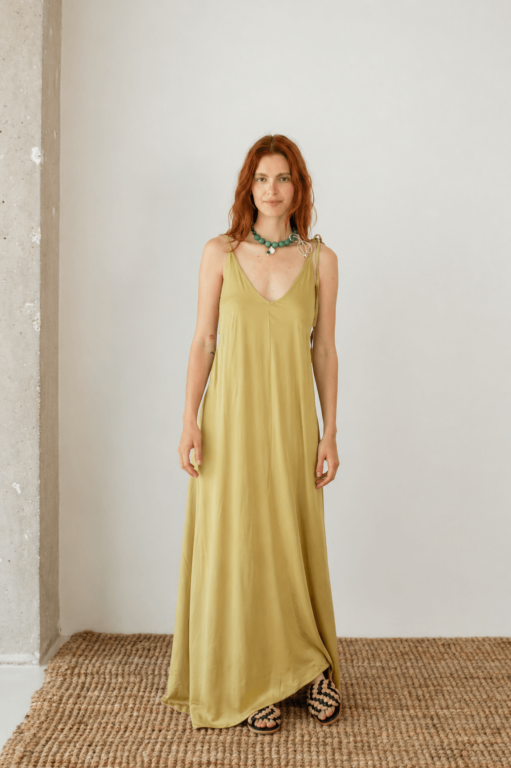 Ecovero Maxi Dress in Soft Olive, lightweight dress with adjustable straps and pockets for Spring–Summer 2026.