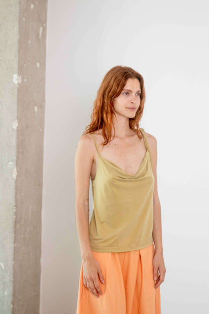 Cupro Drape Slip Top in Soft Olive, a lightweight and breathable essential with a flattering draped neckline.