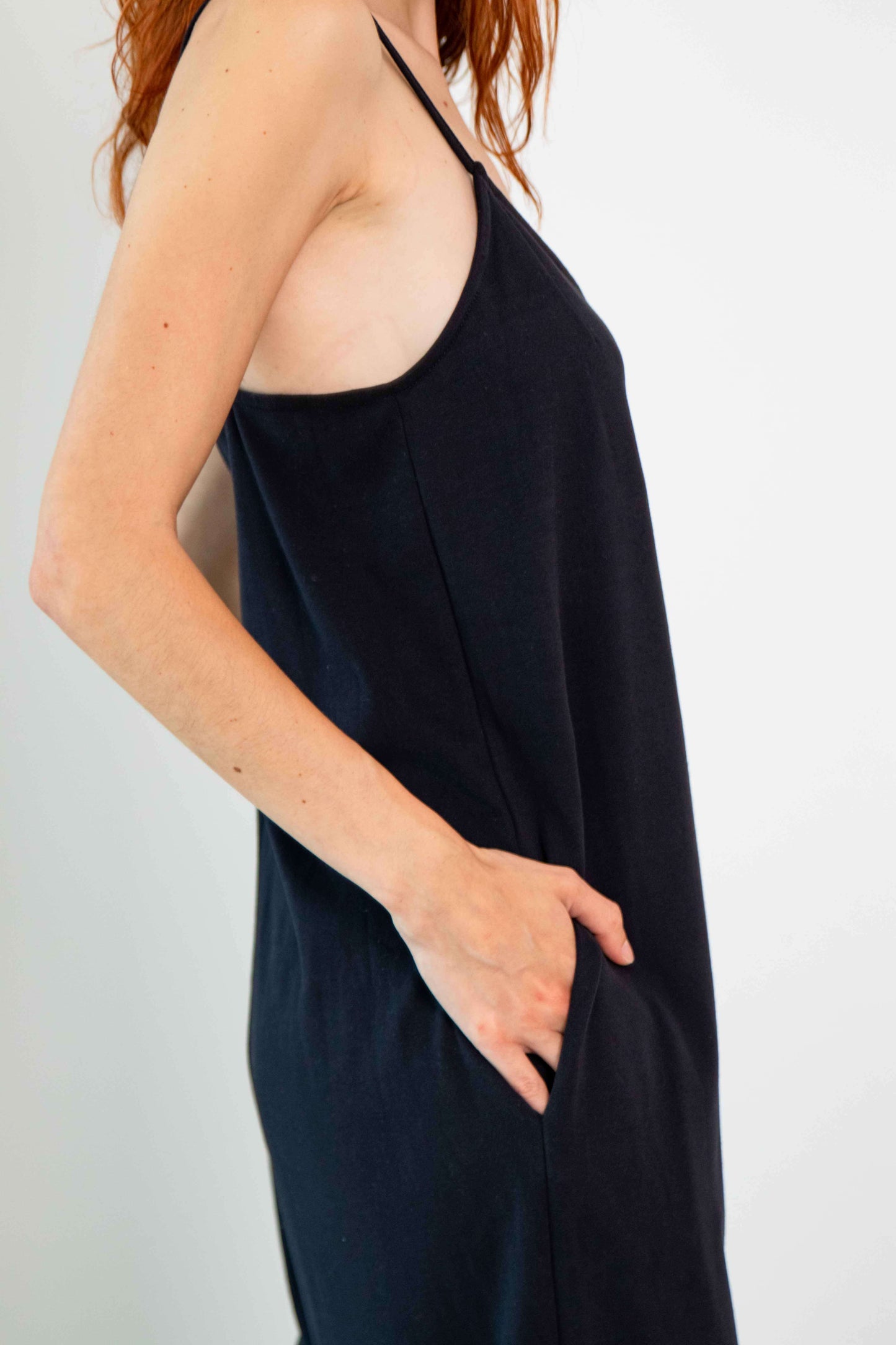 Organic Cotton Wide Jumpsuit in Black featuring a side pocket and slim straps for a relaxed summer look.