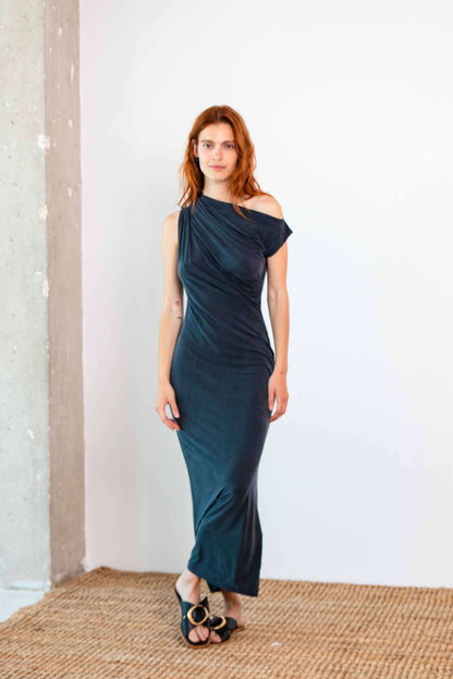Drape Cupro Midi Dress in Slate Black displayed on a model showcasing its elegant silhouette and draped neckline.