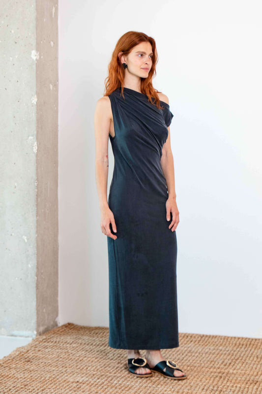 Drape Cupro Midi Dress in Slate Black worn by model, showcasing its elegant draped design and flattering fit.