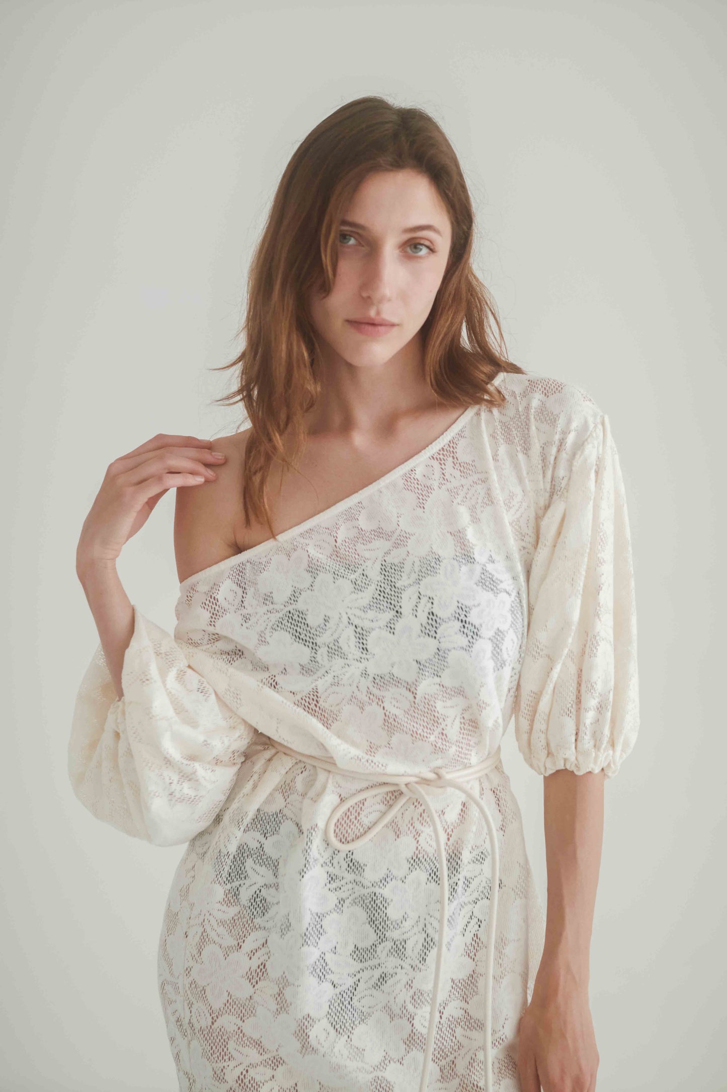 Model wearing a Lace Boho Maxi Dress with balloon sleeves and lace belt, showcasing effortless boho chic style.