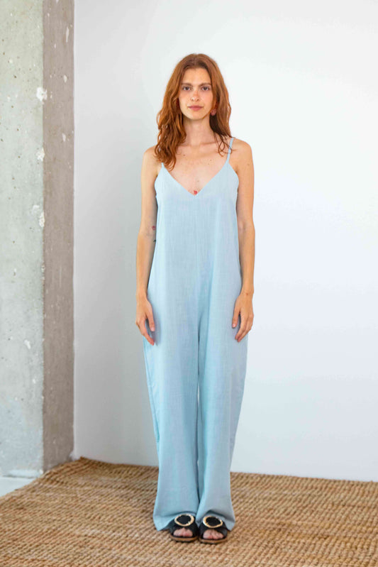 Organic Cotton Wide Jumpsuit in Pale Blue, showcasing an oversized silhouette and slim straps for summer styling.