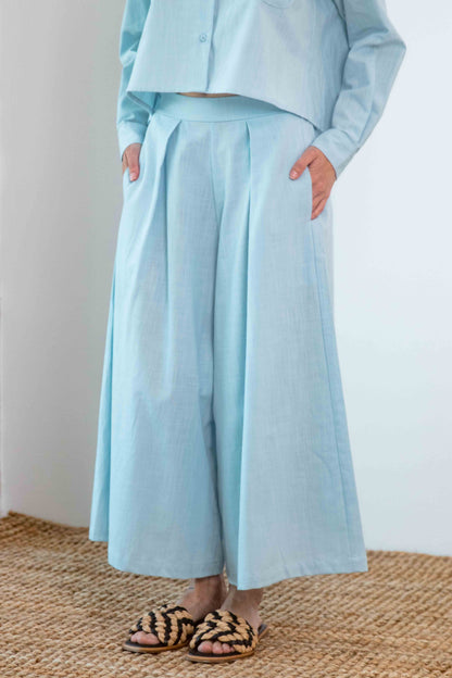 Organic Cotton Wide Culottes in Pale Blue worn with a matching top, showcasing a relaxed and modern silhouette.