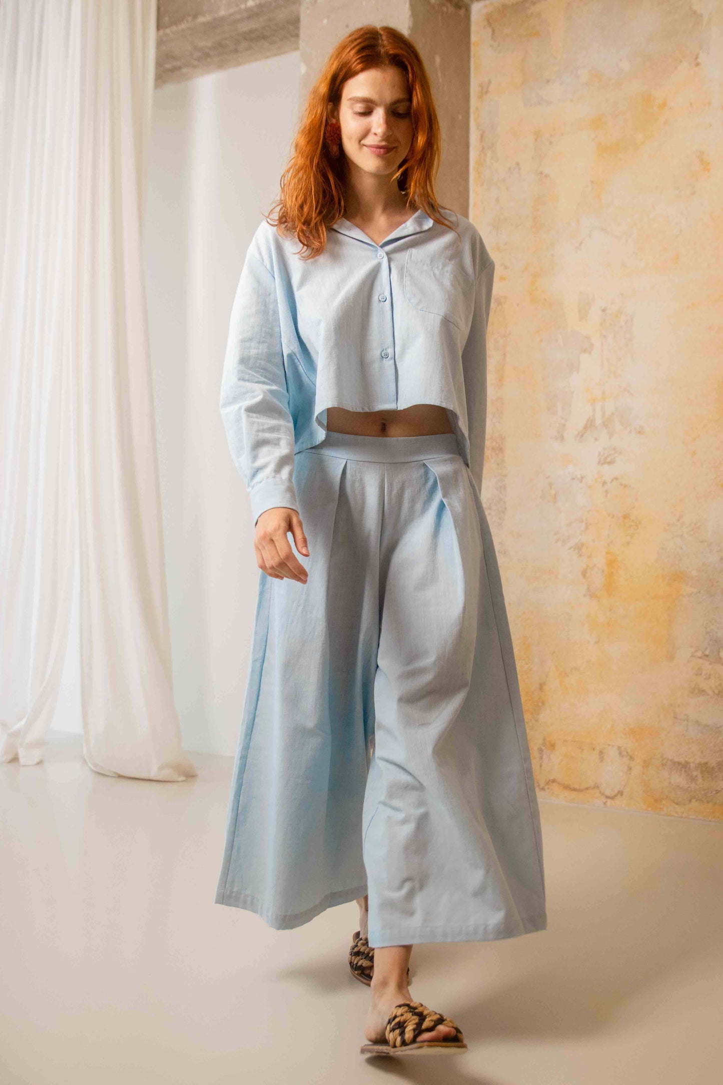 Organic Cotton Wide Culottes in Pale Blue worn by model, featuring a relaxed silhouette and oversized design.