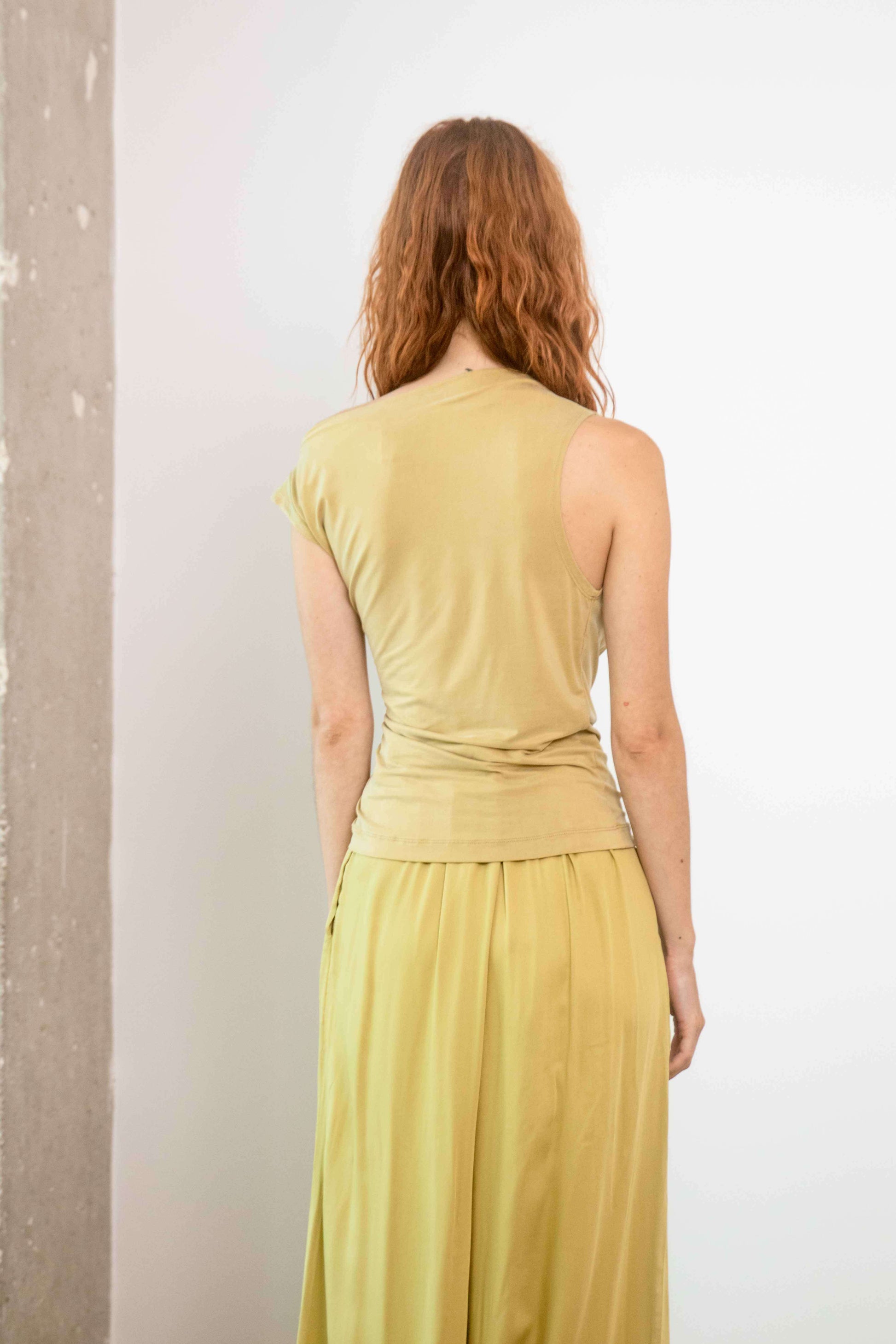 Wide Ecovero Trousers in Soft Olive styled with a matching top.