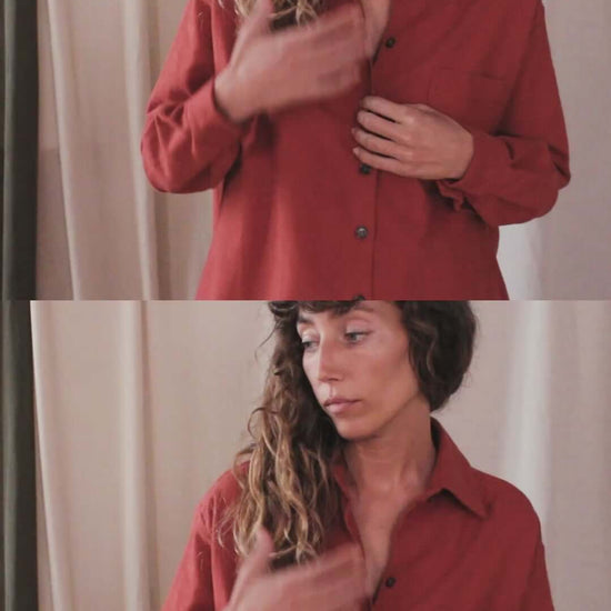 Model wearing rust organic cotton wide overshirt, styled for autumn layering and showcasing eco-friendly buttons.