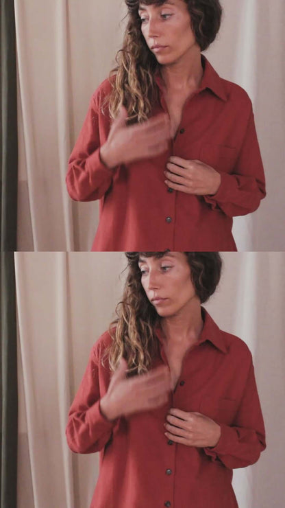 Model wearing rust organic cotton wide overshirt, styled for autumn layering and showcasing eco-friendly buttons.