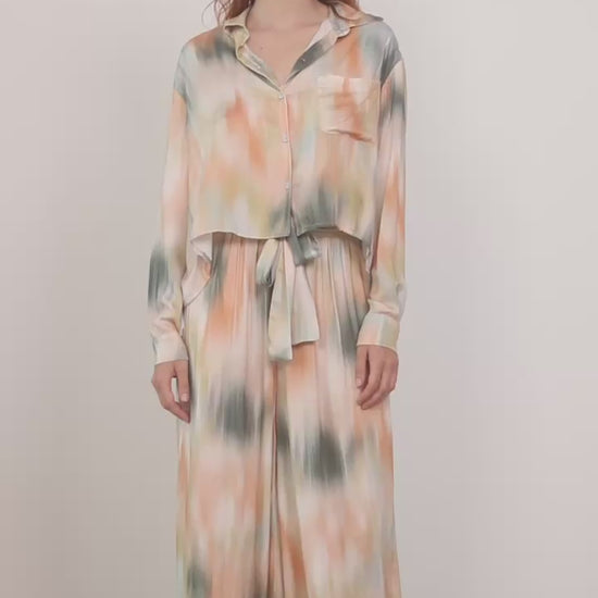 Printed Cropped Ecovero Viscose Oversized Shirt displayed in a fluid, multicolored design on a model.